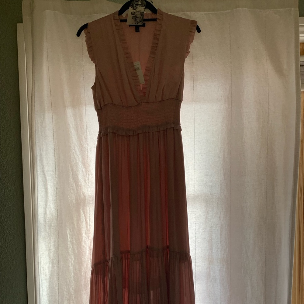Beautiful mauve dress high low bottom. Sheer would need slip. V-neck& elast wais